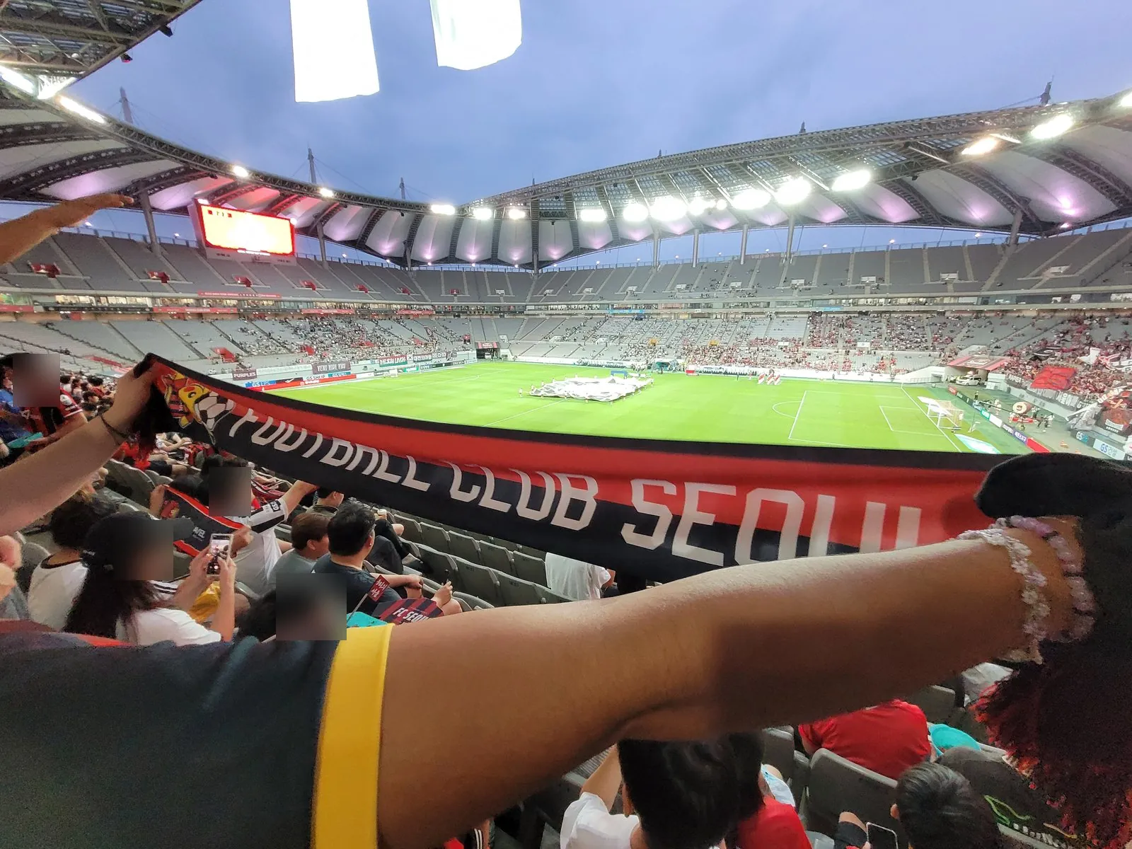 An FC Seoul scarf held up in the stands at Seoul World Cup Stadium